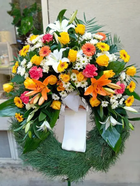 Trauerkranz Kopfgarnierung Lilien orange