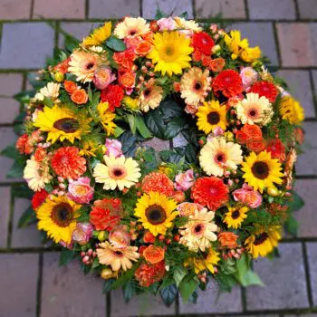 Trauerkranz orange mit Sonnenblumen